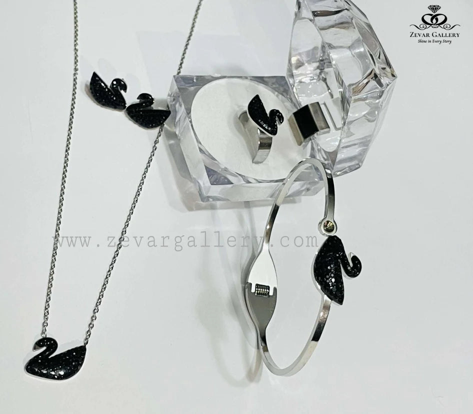 Zevar Gallery Black Swan 4-piece stainless steel jewellery set with pendant, bracelet, ring, and stud earrings – elegant black design